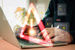 © Eakrin - Hand and warning caution 404 page not found error system or problem computer network or firewall protection for cyber threat attack security risk alert hacker or cybercrime safety or virus prevent.