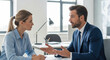 © Kevin - Business meeting concept. Businessman manager discussing project with businesswoman colleague. Professional teamwork, collaboration, negotiation, job interview, partnership in corporate office.