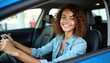 © Pete - Young woman smiles sitting in new car after purchase at dealership. Happy female driver holds steering wheel. Successful deal, client buying vehicle, transportation, road trip.