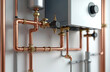 © Pete - Close-up of home heating system installed on wall. Copper pipes, valves, pressure gauge, gas boiler details, central heating system, water heating. Modern tech for house.