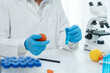 © Shisu_ka - Scientist check chemical food residues in laboratory. Control experts inspect quality of fruits, vegetables. lab, hazards, ROHs, find prohibited substances, contaminate, Microscope, Microbiologist