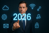 Biznesmen dotykający cyfry 2026 na tle ikon technologicznych – wizja przyszłości cyfrowej i innowacji
