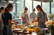 © Pete - Culinary class in full swing. Unrecognizable people in gray aprons prepare food in kitchen. Cooking class. People work, learn, prepare dishes, eat, enjoy. Blurred background for food blog culinary
