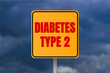 © Emre Akkoyun - Diabetes type 2 message written on metal sign on cloudy sky background. Conceptual diabetes type 2 symbol. Copy space.