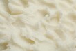 © New Africa - Texture of organic shea butter as background, top view
