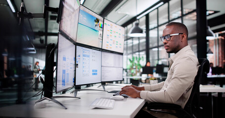 Wall Mural - young african american graphic designer creating interface