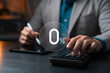 © Thapana_Studio - 0% interest and financial calculation. Businessman using calculator and tablet to compute payment or loan with zero percent symbol, representing finance planning and business promotion.