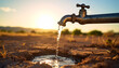 © Monmeo - Dripping Tap: A lone tap, with water stream flowing freely. In the background, the sun sets over a landscape, adding to the starkness.