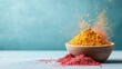 © Dulemegapixel - A beautifully arranged wooden bowl filled with vibrant yellow and pink powdered spices, creating a visually appealing composition full of texture and color.