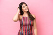 © luismolinero - Young Brazilian woman isolated on pink background thinking an idea
