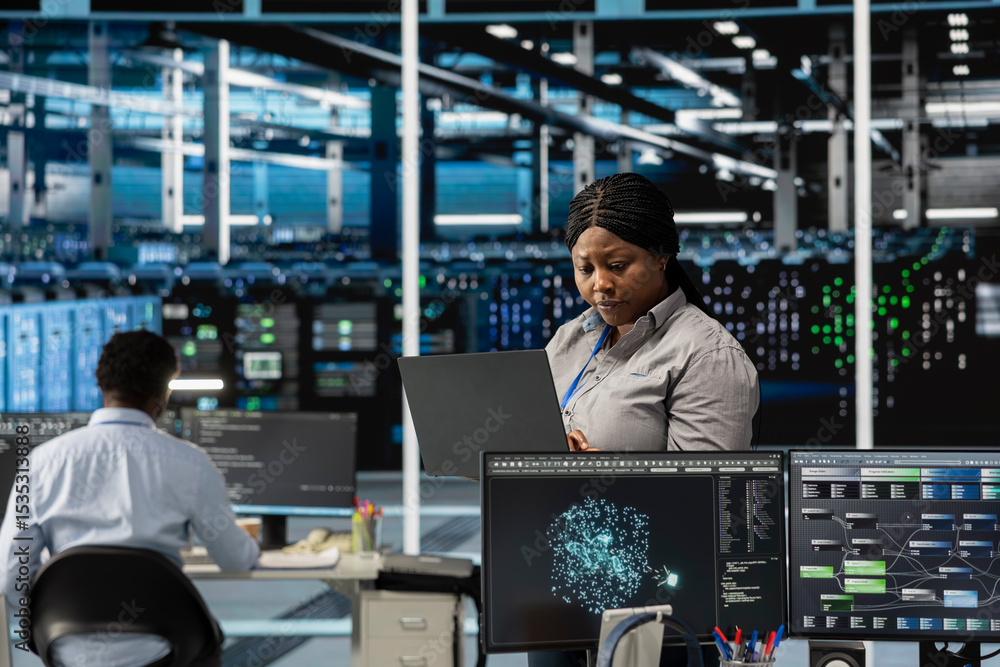 Data center employee using artificial intelligence visualization tools ...