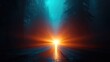 © twilight mist - Road through a misty forest illuminated by a vibrant sunrise.