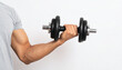 © Rahmat - Male Hand Holding Iron Dumbbell on White Background for Fitness, Gym, or Strength Concept