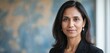 © Oleksandr - Portrait of confident mature mixed ethnic woman teacher in formal suit in office or classroom. Successful executive leader. Businesswoman in 40s with positive, diverse, smart look.