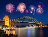 Fireworks over Sydney Harbour Bridge at night