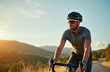 © Vadym - Professional male cyclist rides road bike at sunset. Adult man in sport glasses and helmet enjoys outdoor summer recreation. Active lifestyle sport adventure in beautiful nature.
