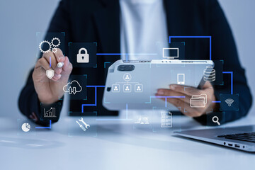 person using smartphone, tablet with sdk icon on virtual screen. sdk software development kit progra