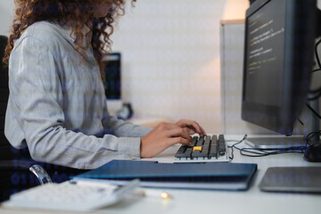 hacking and malware concept. hacker using abstract laptop with binary code digital interface.