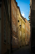 Empty narrow street with traditional colourful terraced houses, Salzburg, Austria