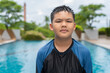 © Ranta Images - Teenage boy ready to swim in swimming pool