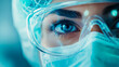 © sommersby - Medical Concept: Close-up of a healthcare worker in protective gear, wearing glasses and a face mask