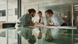 © Rony - Three Businessmen Collaborative Meeting Modern Office Sunlight Reflection Glass Table Serious Discussion Professional Teamwork Corporate Strategy Planning Project Development Ideas Brainstorming
