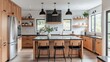© sadad - Bright modern kitchen with wood cabinets, black countertops, and pendant lighting