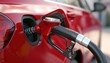 © Andrii - Close-Up Detail View Of Fuel Autogas Pump Gun Connected With Nozzle Adapter To Car Tank For Refilling At Gas Station. Vehicle Refueling With Liquefied Lpg Or Lng. Enhanced Safety Technology.