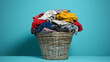 © Mahmud - A laundry basket overflowing with clothes in two sizes represents the concept of managing household chores
