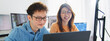 © Urbanscape - Asian male, female programming developer work together at home office, brainstorm discussion. Information technology, software engineer programmer coding job, man woman coworker teamwork. Happy smile