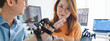 © Urbanscape - Asian male, female programming developer work together at home office, coding robotic arm machine. Information technology, software engineer programmer job, man woman coworker teamwork concept
