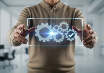 man holding digital display with gears and checkmark, automation concept