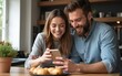 © car - Cheerful bearded father having video call while using smartphone together near sweet pastry in kitchen. High quality