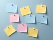© Baihaqi - Pastel Colored Sticky Notes on a Blue Background Organization and Planning
