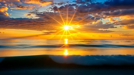 Wall Mural - golden sunrise over ocean waves a breathtaking view of nature's beauty