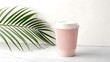 © Rocky - Pink disposable coffee cup with palm leaf