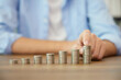 © offsuperphoto - young man hands counting coins on a table for save money