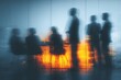 © cui - Side view of blurred silhouettes of businessmen talking in conference room, view through the transparent glass wall. High quality
