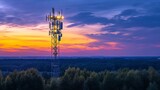 A captivating image of a cell phone tower at dusk, illuminated by soft lights, creating a beautiful contrast against the darkening sky.