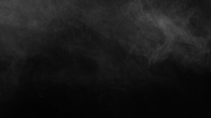 Wall Mural - gentle, slow-moving white fog creates moody, atmospheric texture on black background. ideal for over