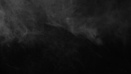 Wall Mural - ethereal mist and fog gently drift in from the left side of a dark screen. creates a mysterious, cal