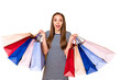 © deagreez - Pretty lady holding many packs hands can't hide gladness wear striped white blue dress isolated yellow background