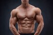© Dzikrul Husnani - Muscular torso of a man with defined chest shoulders arms and abs set against a dark gray background