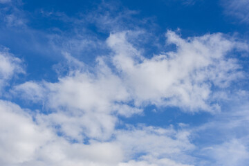 Wall Mural - scenic view of white clouds on the blue sky.