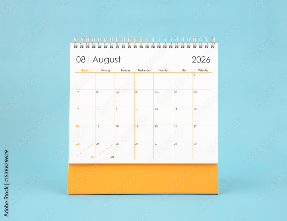 August 2026 white desk calendar on blue color background. Planning and ...