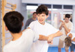 © JackF - Sedulous underage practitioner of self-defense courses applying attack methods on his opponent