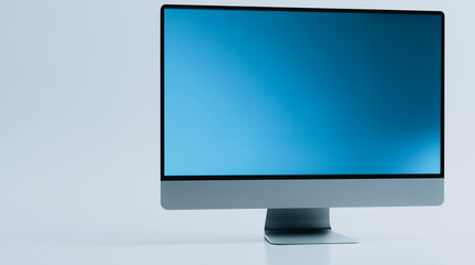 Wall Mural - monitor in the spotlight: a sleek modern monitor, displaying a vibrant blue screen. a minimalist com