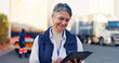 © peopleimages.com - Logistics, smile and truck with woman and tablet for fleet manager, shipping route or delivery. Cargo transport, digital schedule and distribution with mature person outdoor as dispatch supervisor