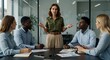 © Saleh - Female Executive CEO Leading a Strategic Planning Session with a Diverse Team in a Modern Corporate Boardroom.