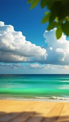 Wall Mural - A sunlit wooden table overlooks the tranquil summer sea under a partly cloudy blue sky